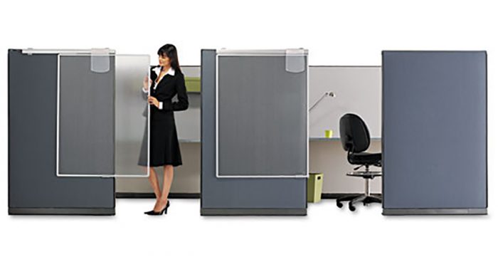Woman Demonstrating the Quartet Workstation Privacy Screen